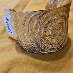 Ornate Gold Cuff Bracelet with Intricate Patterns